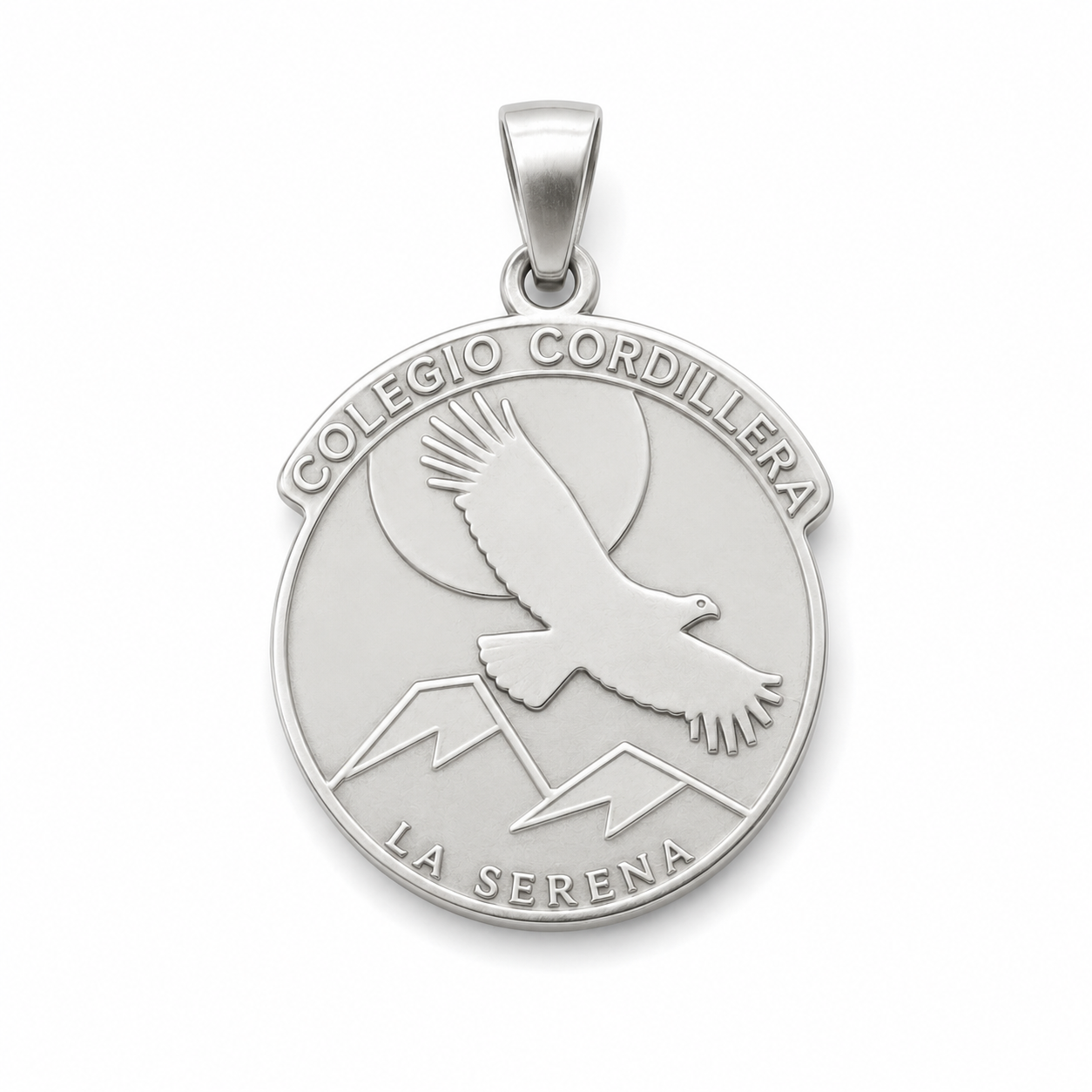 Escudo del Colegio Cordillera reproducido en plata